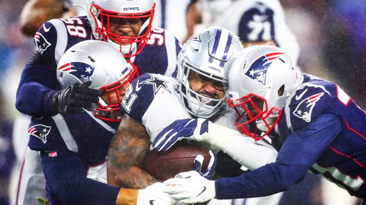 Defensa de Patriots deteniendo a Zeke Elliott