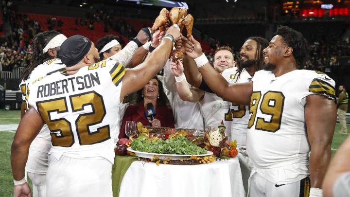 Equipo de Saints en Thanksgiving