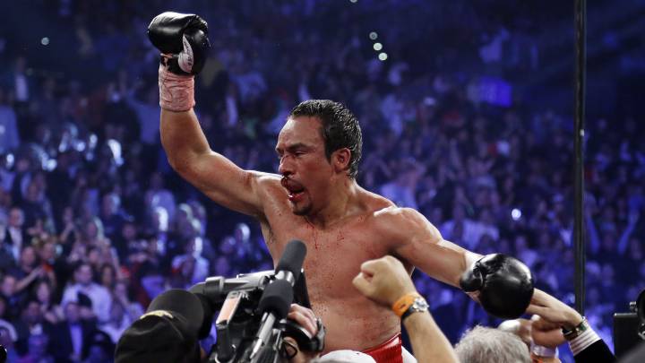 Juan Manuel Márquez celebra la victoria de su cuarto combate ante Manny Pacquiao