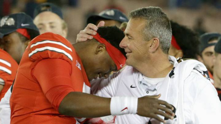Dwayne Haskins y Urban Meyer