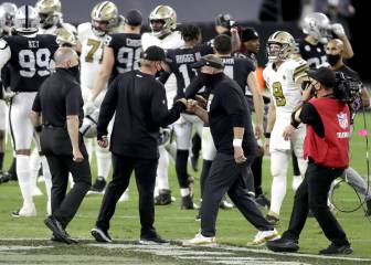 Gruden y Payton, castigados por mal uso de máscaras