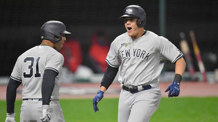 Gio Urshela y Aaron Hicks