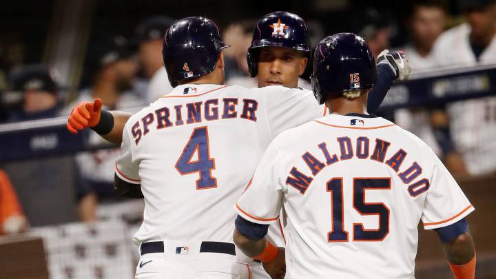 Michael Brantley, George Springer y Martín Maldonado