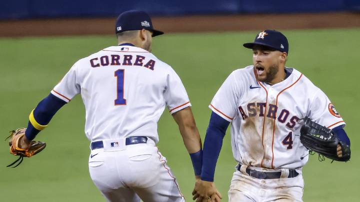 George Springer y Carlos Correa
