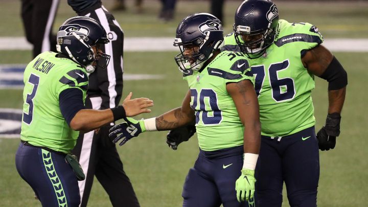 Russell Wilson y Carlos Hyde