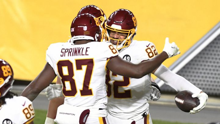 Logan Thomas y Jeremy Sprinkle con el WFT