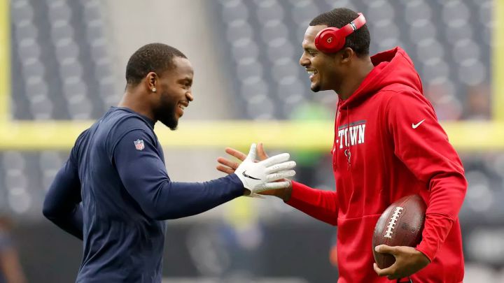Kareem Jackson y Deshaun Watson