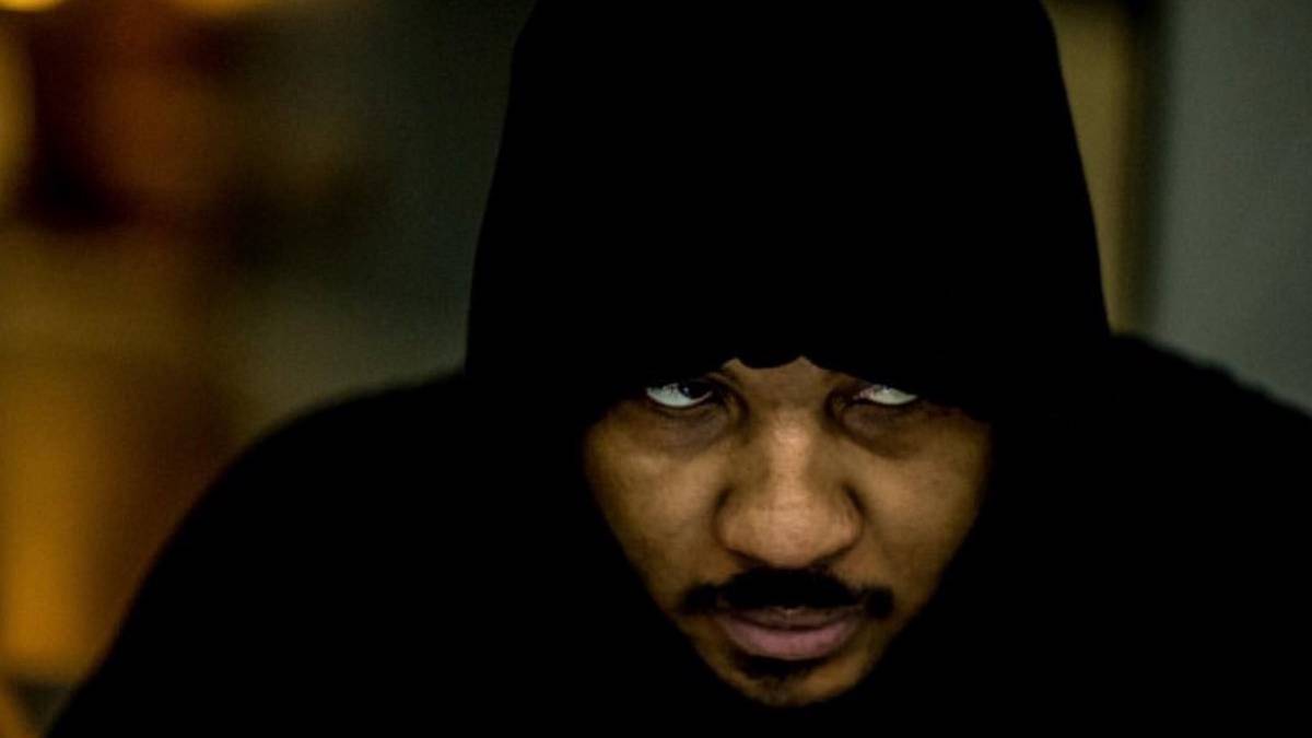 Carmelo Anthony under a black hoodie