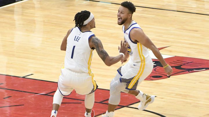 Damion Lee y Stephen Curry