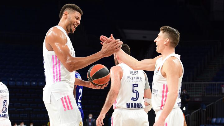 ISTANBUL, TURKEY - DECEMBER 29: Jaycee Carroll, #20 of Real Madrid and Walter Tavares, #22 of Real Madrid  celebrate their victory during the 2020/2021 Turkish Airlines EuroLeague Regular Season Round 17 match between Anadolu Efes Istanbul and Real Madrid  at Sinan Erdem Dome on December 29, 2020 in Istanbul, . (Photo by Aykut Akici/Euroleague Basketball via Getty Images)