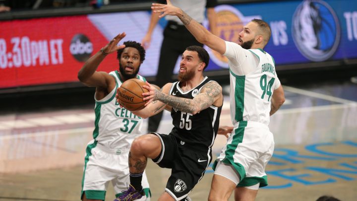 Apr 23, 2021; Brooklyn, New York, USA; Brooklyn Nets forward Mike James (55) drives to the basket against Boston Celtics power forward Semi Ojeleye (37) and shooting guard Evan Fournier (94) during the third quarter at Barclays Center. Mandatory Credit: Brad Penner-USA TODAY Sports