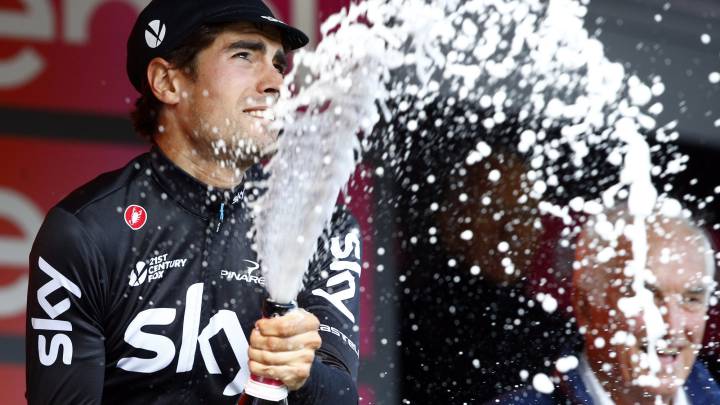 Spanish cyclist Mikel Landa of Sky team sprays champagne as he celebrates on the podium after winning the 19th stage of 100th Giro d'Italia, Tour of Italy, from San Candido to Piancavallo of 191 km on May 26, 2017 in Piancavallo.