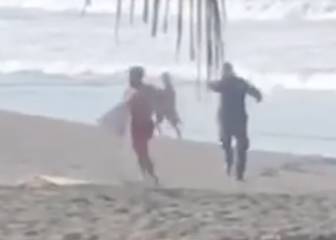 Cazan a un pescador sacando la pistola en una discusión con un surfista