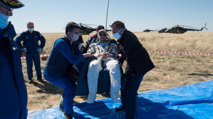 Los tripulantes de la Estación Espacial Internacional aterrizan a una tierra confinada