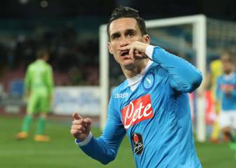 Napoli move joint top after seeing off Chievo