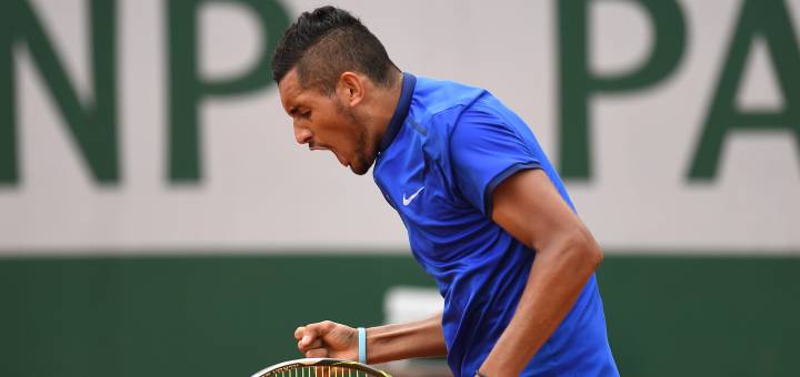 Kyrgios provides sparks on wet Roland Garros opener