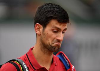 Djokovic escapes disqualification to reach French Open semi