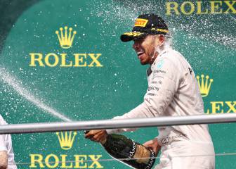 Hamilton coasts to victory to widen gap over Rosberg