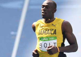 Bolt safely through 200m heats