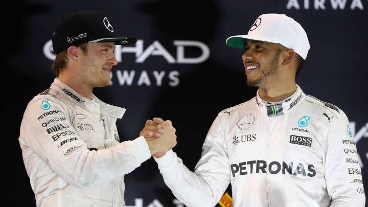 Lewis Hamilton shakes hands with Nico Rosberg