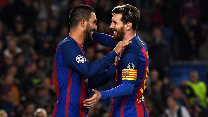 Lionel Messi and Arda Turan