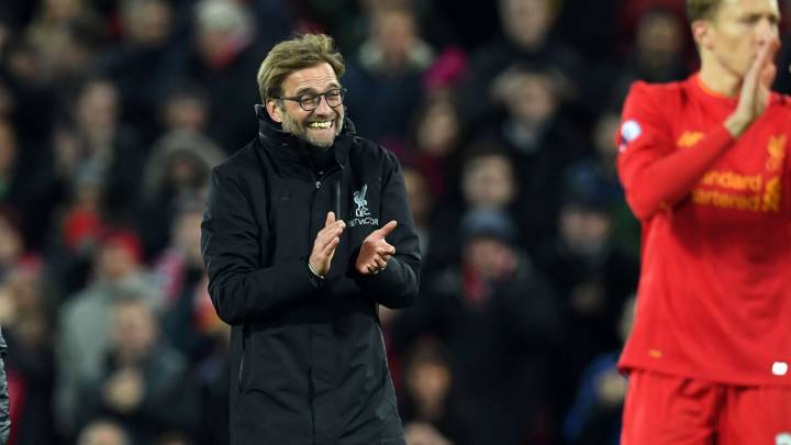 Liverpool's German manager Jurgen Klopp celebrates on the pitch