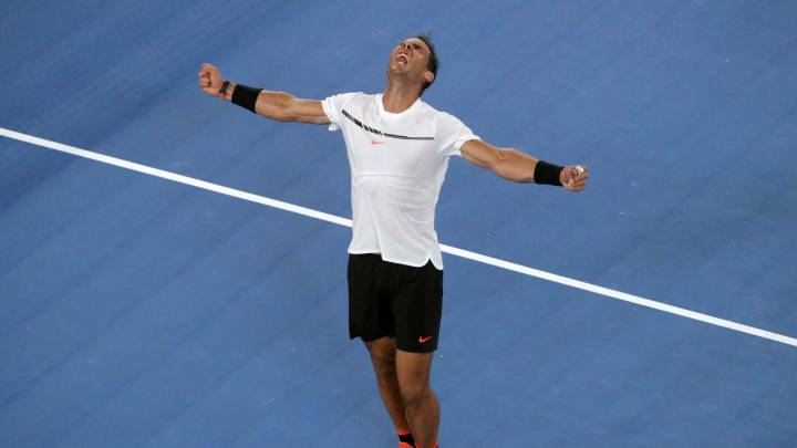 Spain's Rafael Nadal celebrates beating France's Gael Monfils in their men's singles fourth round match on day eight of the Australian Open