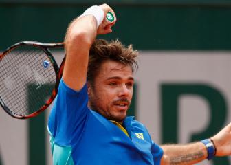 Wawrinka overcomes stumble to oust Kovalik