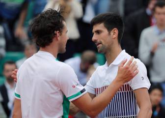 Thiem schools Djokovic to reach French Open last four