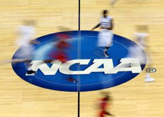 Four coaches, Adidas executive charged in payoff scandal