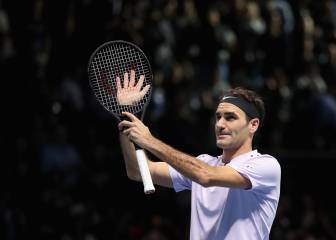 Federer opens ATP finals bid with victory over Sock