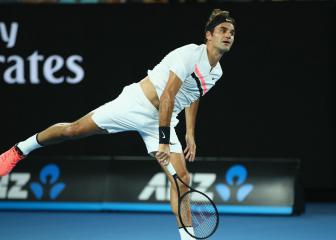 Federer eases past Struff