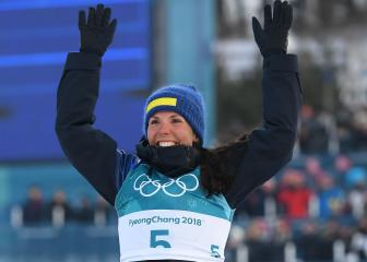 Kalla takes Games' first gold, Bjoergen makes history