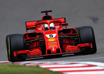 Vettel snatches pole from Raikkonen as Ferrari dominate