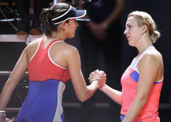 Muguruza reveals back injury forced Stuttgart retirement