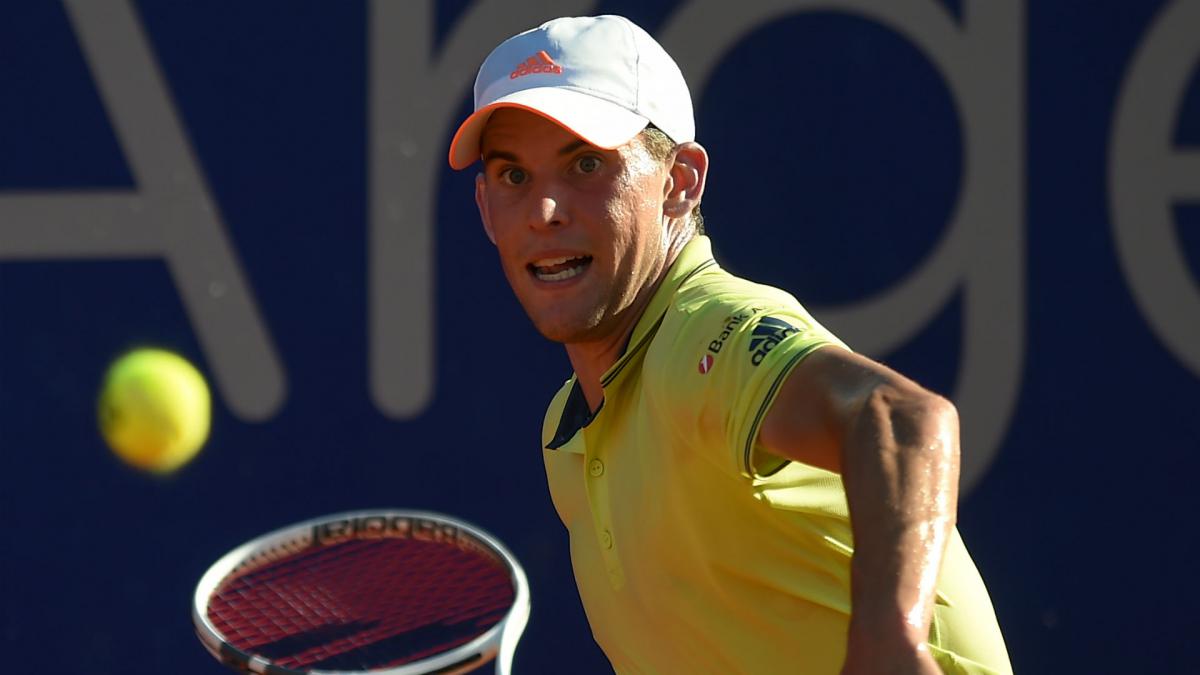 thiem comfortable in victory as rain delays wawrinka