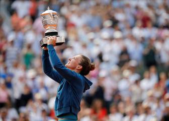 Relieved Halep fights off nerves to end grand-slam wait
