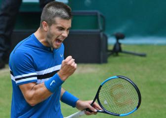 Coric stuns Federer to claim title in Halle