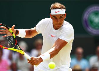 Nadal eases past De Minaur to stay on top of the world