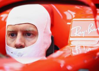 Vettel on Germany pole with lap record after Hamilton woe
