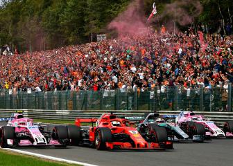 Vettel closes gap after Alonso crash in Belgium