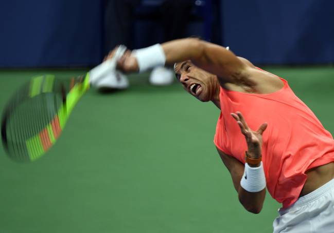 rafa nadal tight-lipped over knee injury scare
