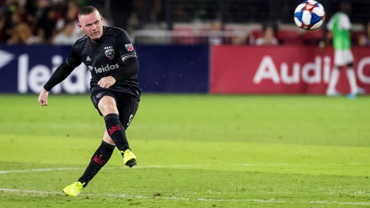 Wayne Rooney kicks the ball against the Philadelphia Union during the second half at Audi Field