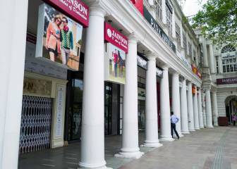 Which shops are now allowed to open in India?