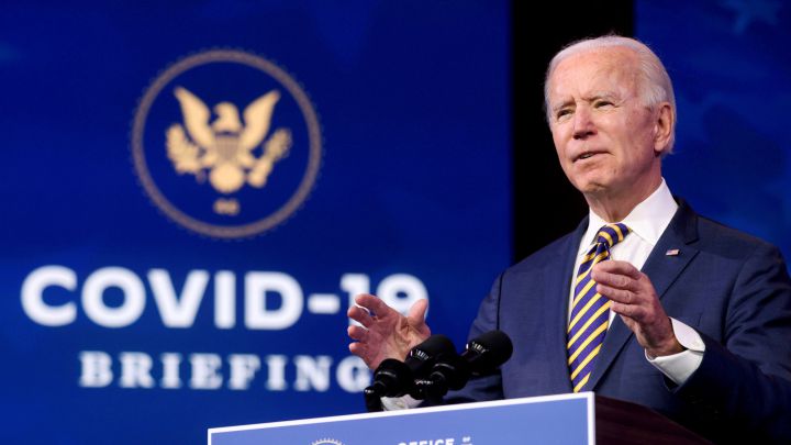 What is the minimum wage that Biden has proposed and what do the experts think of it?