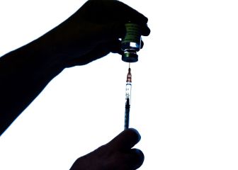 What precautions should you take after getting covid-19 vaccine?