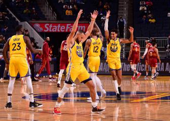 Warriors welcome back fans as red-hot Curry sinks Nuggets