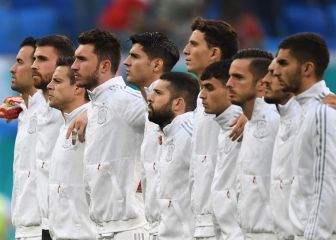 Why do Spain players not sing the national anthem?