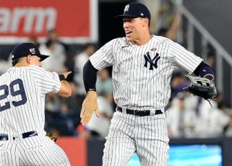 Yankees split doubleheader with Mets as Braves stun Marlins late