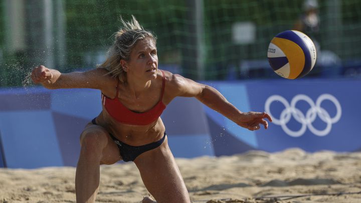 What are the differences between indoor volleyball and beach volleyball in the Olympics?
